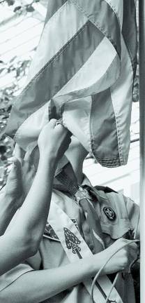 Celebrating Flag Day Local Boy Scouts lowered the flag this past Memorial Day.