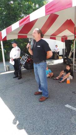 Riding for St. Jude's kids Photos by Laurie Gordon Winnie's son, Mike Petullo, address attendees.