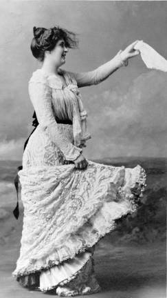 Don’t Stifle That Sneeze! Woman in lace dressing waving a hankerchief, c. 1900