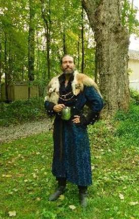Knights and faeries roman the woods of Sparta King James (James Kimball), property owner and founder of the Sparta Renaissance Festival, took a moment to strike a royal pose