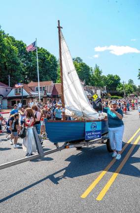 Sparta. Fourth of July events Members of the Lake Mohawk Yacht Club march in the parade.
