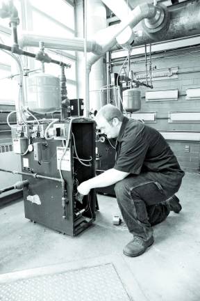 Focus on Sussex Tech School programs Photo provided Senior Joseph Schwartz takes gas pressures on a boiler
