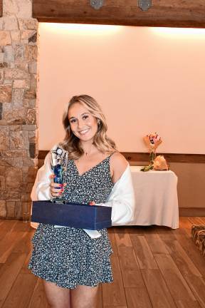 Chamber honors women Bridget Dudziec of Katie’s House receives the Bright Future Award.