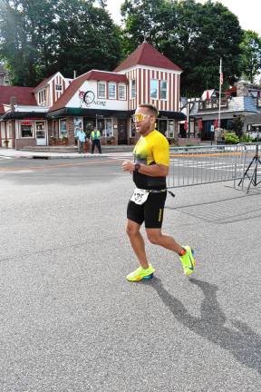 Photos: Pass it Along’s 14th annual Triathlon Yean Jimenez, 41, of Morristown wins the Triathlon, finishing first in the swim section, second in cycling and third in running. Now senior director of aquatics at the Madison Area YMCA, he joined the national swimming team of the Dominican Republic in 1998 and the USA Triathlon National Team in 2018. He won New Jersey State Champion titles in 2022 and 2023.