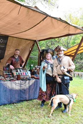 New generation of knights SRF4 Eva and William Whorley of upstate New York with their dog, Taz At left is Colin Maythenwi of Ritual Ops Leatherworks.