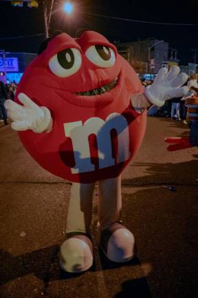 An M&amp;M mascot greets visitors.