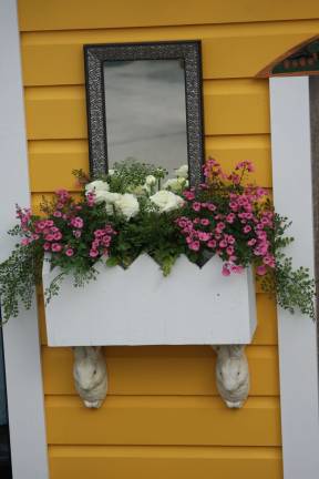 It happens every year A flowerbox display offers ideas to home gardeners.