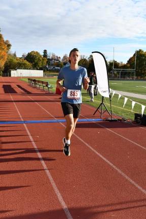 Newton High School hosts Monster 5K Carmine Battaglia of Fredon is shown running the Monster 5K at Newton High School.
