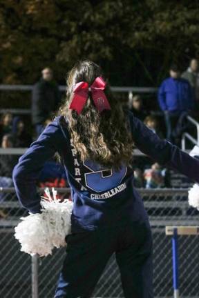 Sparta football clinches sixth victory Sparta Cheer revs up the crowd.