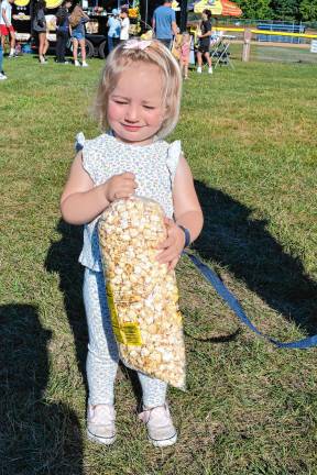 Photos: Byram Fest Charlotte Hoffman of Byram with a bag of popcorn.