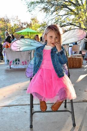 Photos: Norwescap’s Fall Frolic in the Park FF3 Anna Reifler of Montague wears wings.