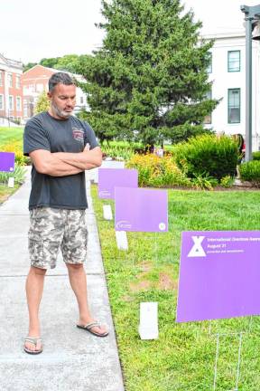 Photos: Overdose Awareness Day Kevin Gulick of Blairstown looks at one of the signs.