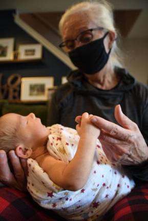 Though the big family Thanksgiving in the city is off, “I’m feeling wonderful, are you kidding me?” said Terry Balton of Milford, Pa. She is planning instead to take a Covid test and “bubble” with her new granddaughter. (Photo by Ryan Balton)