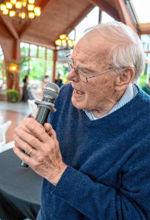 Photos: Casino Night fundraiser <b>Allen Koriakin takes a turn at karaoke.</b>