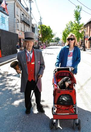 Photos: Memorial Day Parade in Newton Sussex County town crier William Joseph and his wife, Alma, with their dog Bernadette.