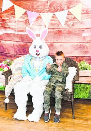 Braiden Bale of Branchville poses with the Easter Bunny at the breakfast hosted by Branchville Hose Company #1 on Sunday, March 3. (Photo by Maria Kovic).