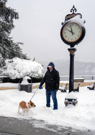 Susan Aldrich walks her dog Jackie in the snow Sunday, Jan. 7 in Sparta. (Photos by Nancy Madacsi)