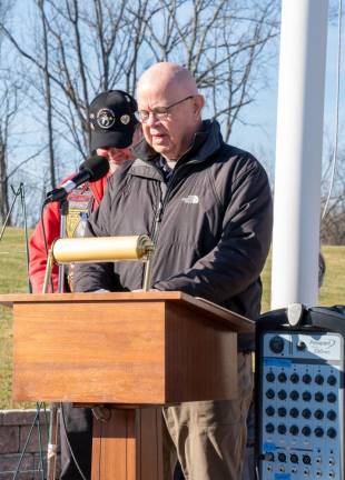 Chris Van Orden, a retired social studies teacher in Hardyston, speaks during the ceremony.