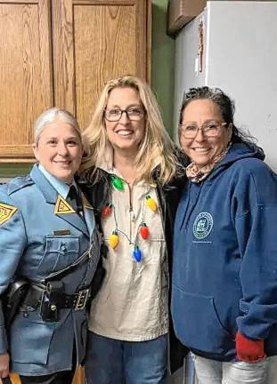 Community food pantry turns 40 From left are State Trooper Sue Mistretta; Robin Hughes, crisis response team manager at Jersey Battered Women’s Service; and Valerie Macchio, executive director of the Sparta Community Food Pantry in 2023. (File photo)