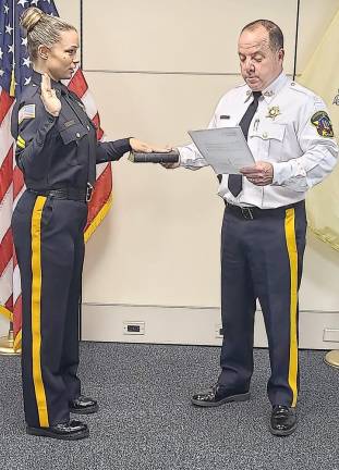 Two veteran correctional officers are promoted Corporal Jamie Caravaggio and Sheriff Michael Strada (Photo provided)