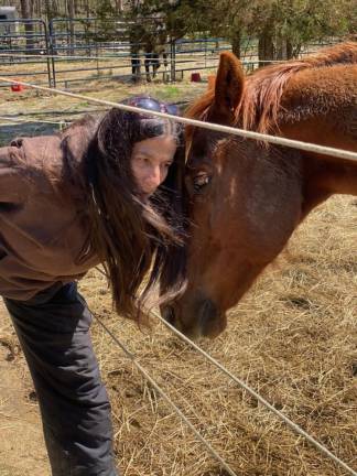 Diane Romano and Sarg, whom she rescued a few years ago from horrific conditions.