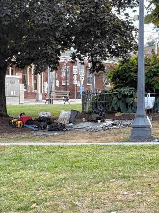 Officials meet on homeless issue Since June, Newton police have increased the number of patrols near the Green, resulting in more quality-of-life summonses. (Photos by Bryan Fumagalli)