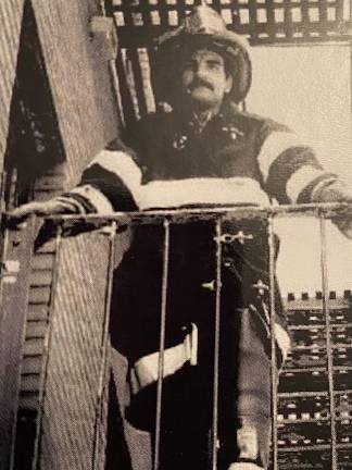 FDNY Fire Marshal Ronald Bucca on an Upper West Side fire escape (Photo provided)