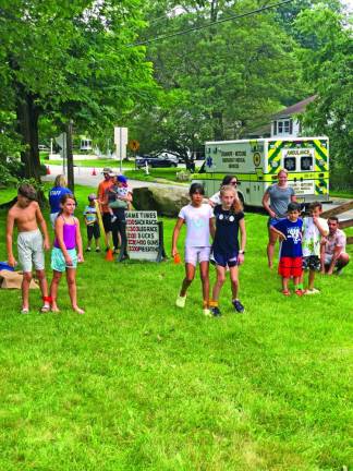 Participants get ready for a three-legged race.