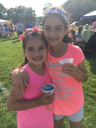 Community comes out for Fredon Day The Brand sisters Sadie, 8, and Lola, 10, enjoy the festivities. Photo by Nikki Brand