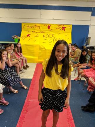 Third-graders walk the red carpet Rock Stars walk the red carpet at the end of the school year. (Photos provided)