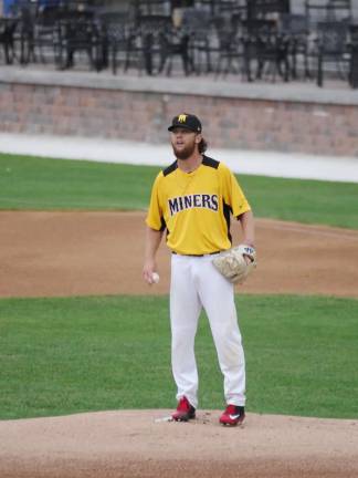 Miners bury Jackals on the diamond Sussex County Miners pitcher Michael Wagner on the mound. Wagner accomplished seven strikeouts in the first four innings. Photos by George Leroy Hunter