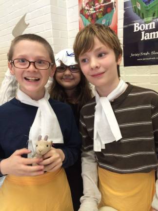 Students bring history alive with Colonial Fair Sewers show off their trade at the Colonial Fair.