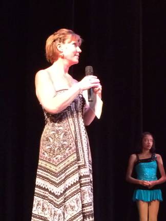 Family works together to teach positives of dance Lori DeVries thanks the crowd after a recent performance. photo by laurie gordon