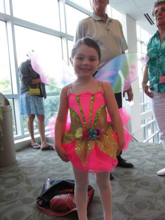 D'Marge dancers welcome summer with recital Photos by Laurie Gordon Savannah Norman, of Stillwater, prepares to go on stage.