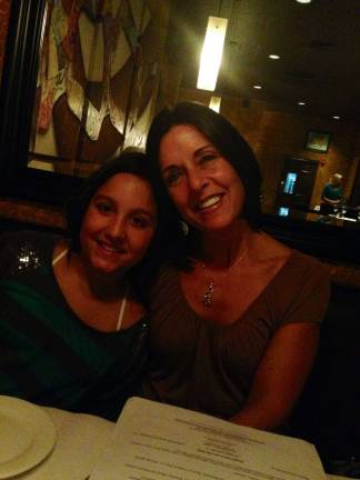 Mommy & Me Contest Caren Johnson and daughter Lauren Scarzafava of Goshen. "To the moon and back. We just love to be together. Out to dinner at our favorite place."