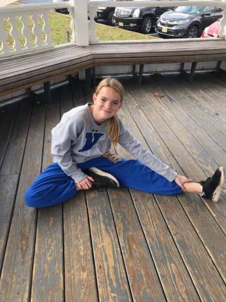 Molly Riva qualifies for Meet of Champions Molly Riva stretches before one of her final workouts heading in to the Meet of Champions.