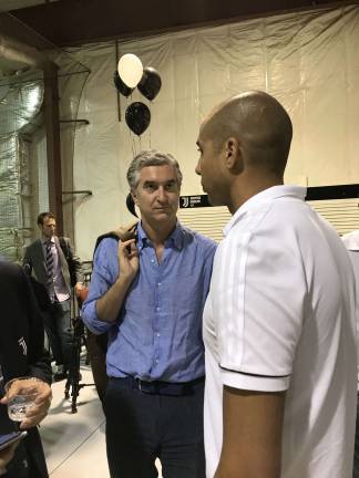 Italian soccer club opens first-ever training center in Sparta The Honorable Francesco Genuardi, Consul General of Italy, chats with one of the Juventus coaches. Photos by Laurie Gordon