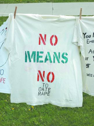 The shirts tell the tale T-shirts made by domestic and sexual assault victims hang in the Newton Green Wednesday.
