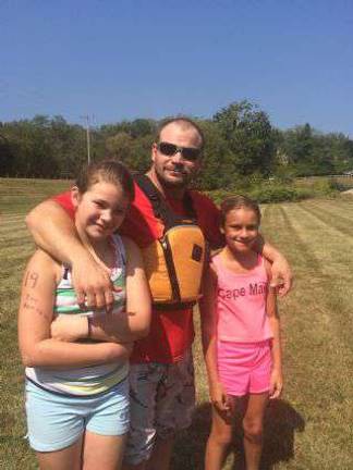 A Labor Day tradition in Lake Paulinskill for families and friends Team Icy Penguins: Julia St. Clair, Dave Carter and friend Ashley Rose Gordon.