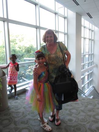 D'Marge dancers welcome summer with recital Ariel Franzone poses with her mother prior to the show.