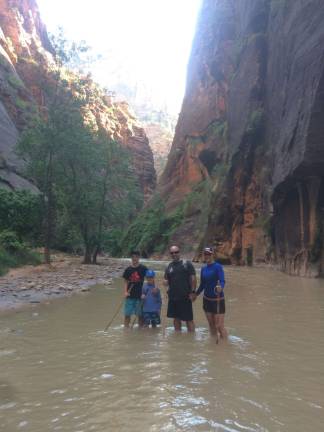 Beloved art instructor named Teacher of the Year When she's not teaching or creating art, Heather Anderson loves enjoying nature's beauty with her family. Here are the Andersons at The Grand Canyon.