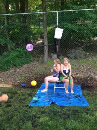 Fond memories of Lake Mohawk Pool LMP owners Carol Carbin and Celia Leo under the Dunk Bucket