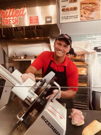 Jersey Mike's employee Bobby Lipyanek exemplifies the positive vibe at the new Jersey Mike's in Sparta.