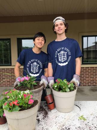 Blair students beautify nonprofit campus Kazuma Hirata '20 (left), Patrick Reardon '19 (right). (Photos by Laurie Gordon)