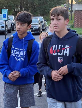 WK3 Eighth-graders Dylan Kelly, left, and Donovan Vergano walk to school Oct. 4. (Photo by Nick Lalama)