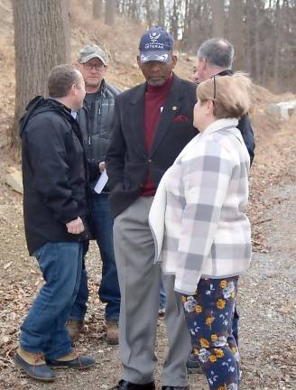 Vernon Township Mayor Howard Burrell talks to Environmental Commission member and Silver Spruce Drive resident Peg Distasi in February.