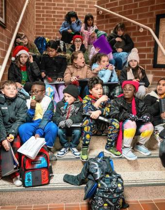 Photos: Tree Lighting in Newton The Merriam Avenue Elementary School choir.