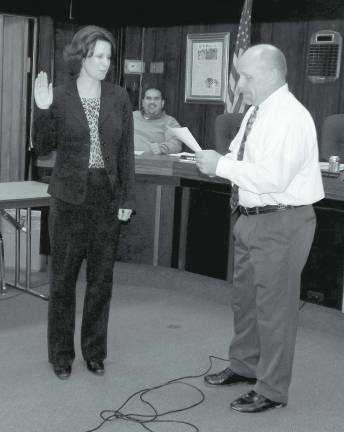 Meet Byram's deputy mayor Mayor James Oscovitch administering the oath of office to new Deputy Mayor Marie Raffay