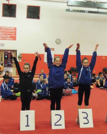 Giant Gymnastics Xcel teams power through first meet Danielle Bruce of Vernon placed 3rd on the balance beam