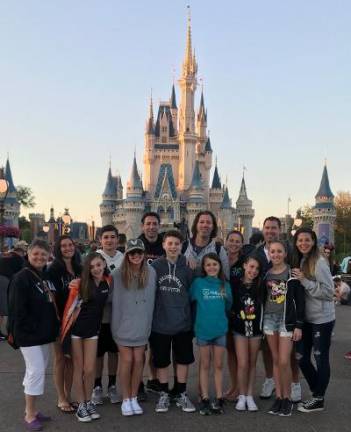 Death spurs family, friends to get colonoscopies The Viscel family poses at a Disney theme park.